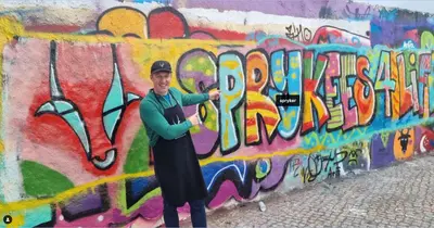 Guido at the office art wall